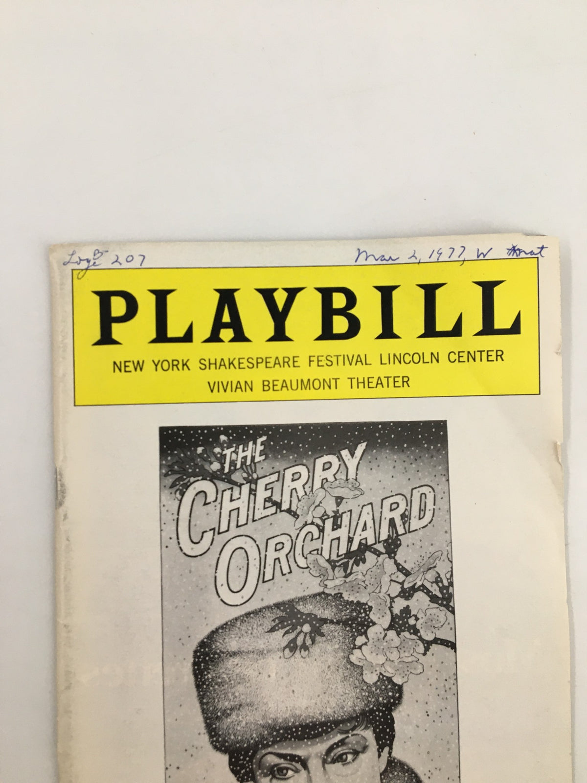 Detailed view of the 1977 Playbill cover for 'The Cherry Orchard' at Vivian Beaumont Theater, capturing the vintage artistic style.