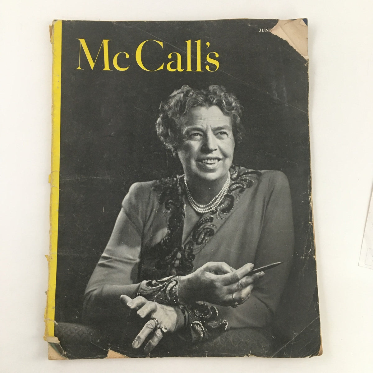 Cover of McCall's Magazine June 1949 featuring Anna Eleanor Roosevelt, depicting her in a vintage black and white photograph with a charming smile and elegant attire.