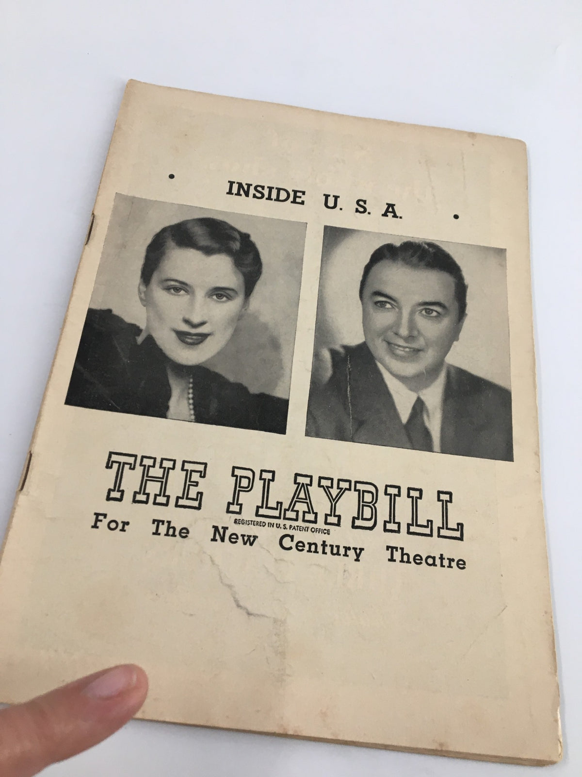1948 Playbill for Inside U.S.A. at the New Century Theatre showcasing images of Beatrice Lillie and Jack Haley with visible wear, highlighting its vintage appeal.