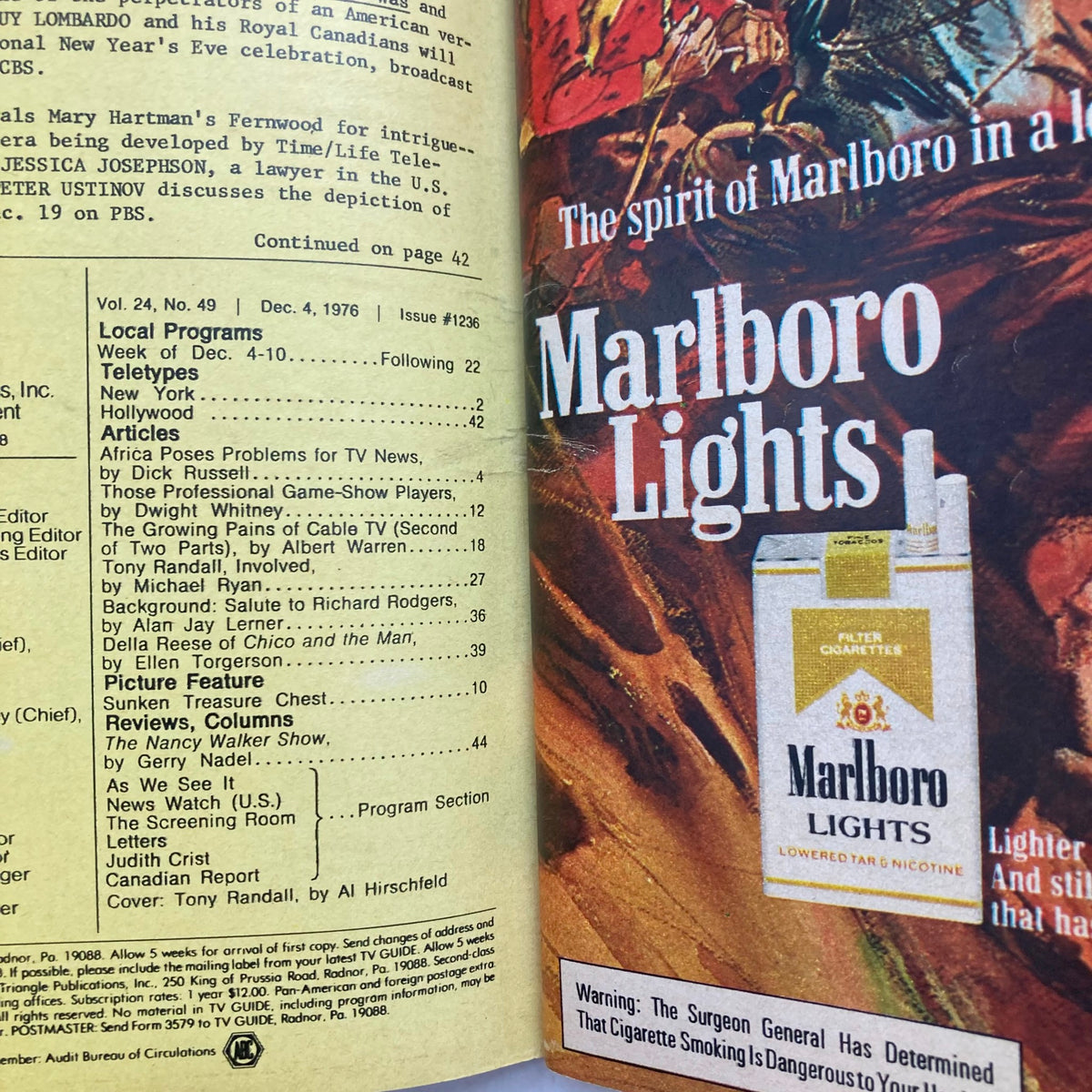 Inside pages of TV Guide Magazine from December 4, 1976, featuring articles and advertisements including Marlboro Lights. Information on local programs and TV features.