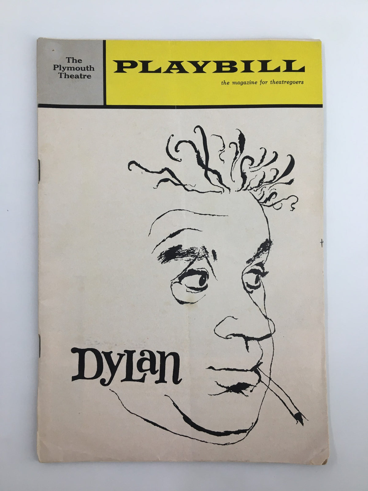 1964 Playbill from The Plymouth Theatre featuring the cover art for Dylan, showcasing an artistic illustration and title prominently displayed.