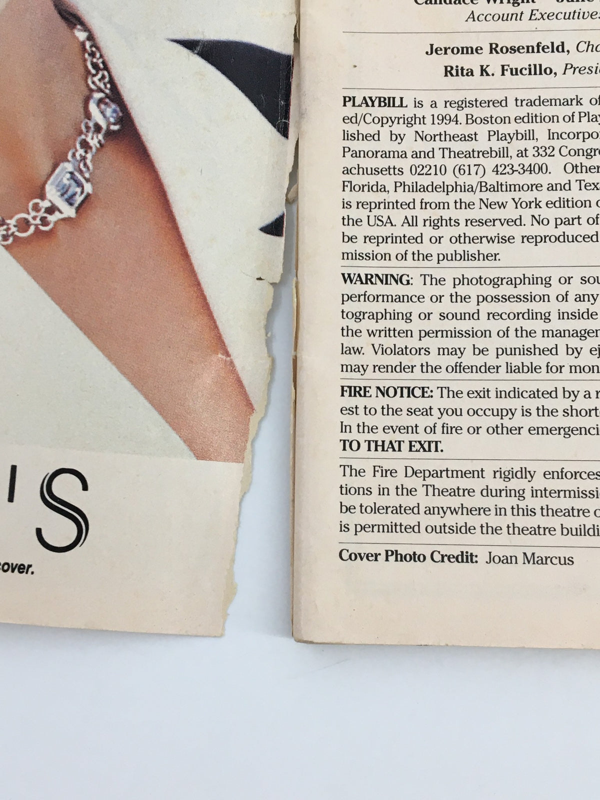 Side view of the 1996 Playbill for Rodgers and Hammerstein's Carousel showing the edge of the program with wear details and a text excerpt about the Playbill's copyright.