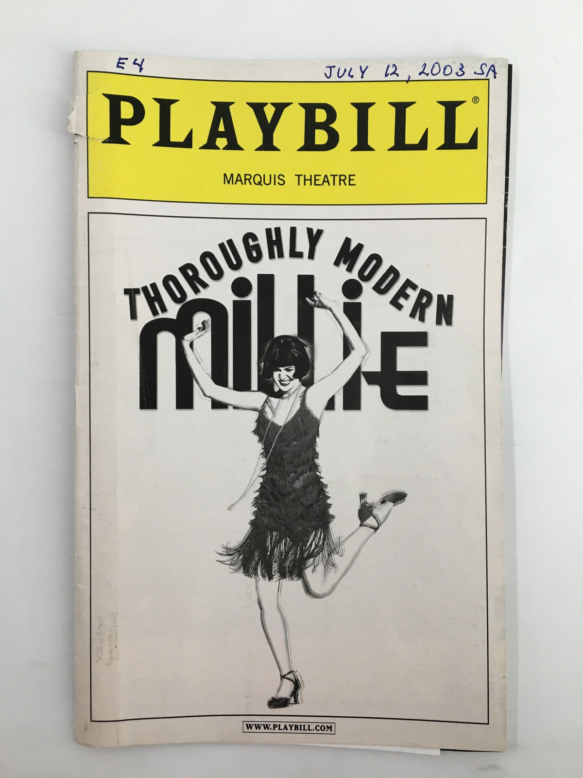 2003 Playbill featuring Whoopi Goldberg in Thoroughly Modern Millie, showcasing the iconic cover art with a dancer in a fringed dress.