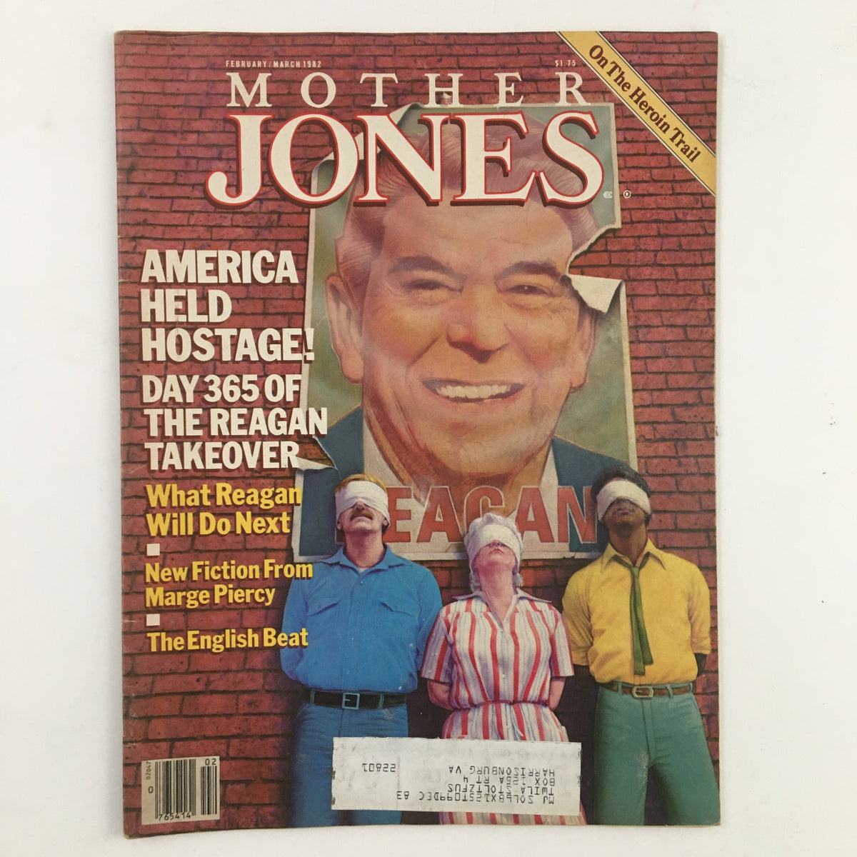 Cover of Mother Jones Magazine February 1982 featuring the headline 'What Will Ronald Reagan Do Next?', with an image of Ronald Reagan against a brick wall and three blindfolded individuals in front.