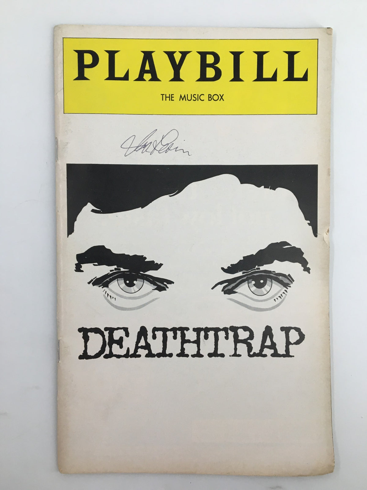 1978 Playbill for Deathtrap featuring striking artwork with intense eyes, showcasing the iconic Broadway production at The Music Box Theater, starring John Wood and Marian Selders.