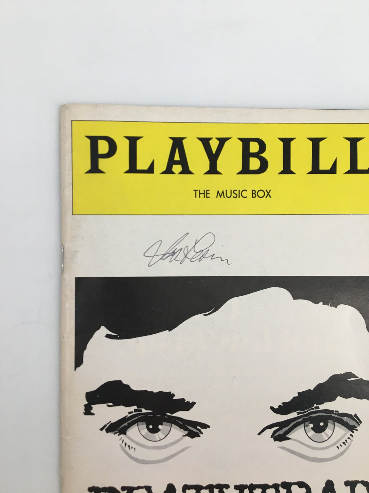 Close-up of the 1978 Playbill for Deathtrap, featuring the title and signature from John Wood, from the iconic production at The Music Box Theatre.