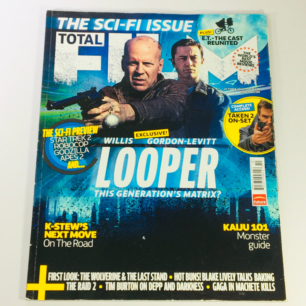 Cover of Total Film Magazine October 2012 #198 featuring Bruce Willis and Joseph Gordon-Levitt, highlighting the sci-fi issue with a focus on the film Looper, along with other movie previews and features.
