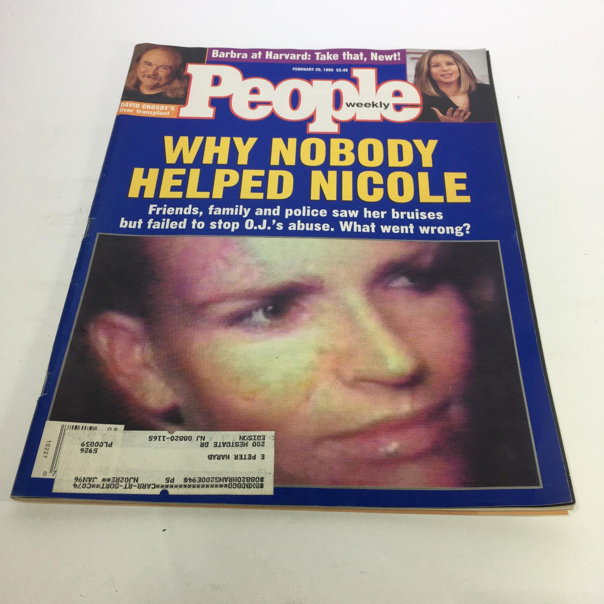 Cover of People Magazine dated February 20, 1995, featuring the headline 'Why Nobody Helped Nicole' with a close-up of Nicole Simpson's face, discussing domestic violence and the societal response surrounding O.J. Simpson's trial.