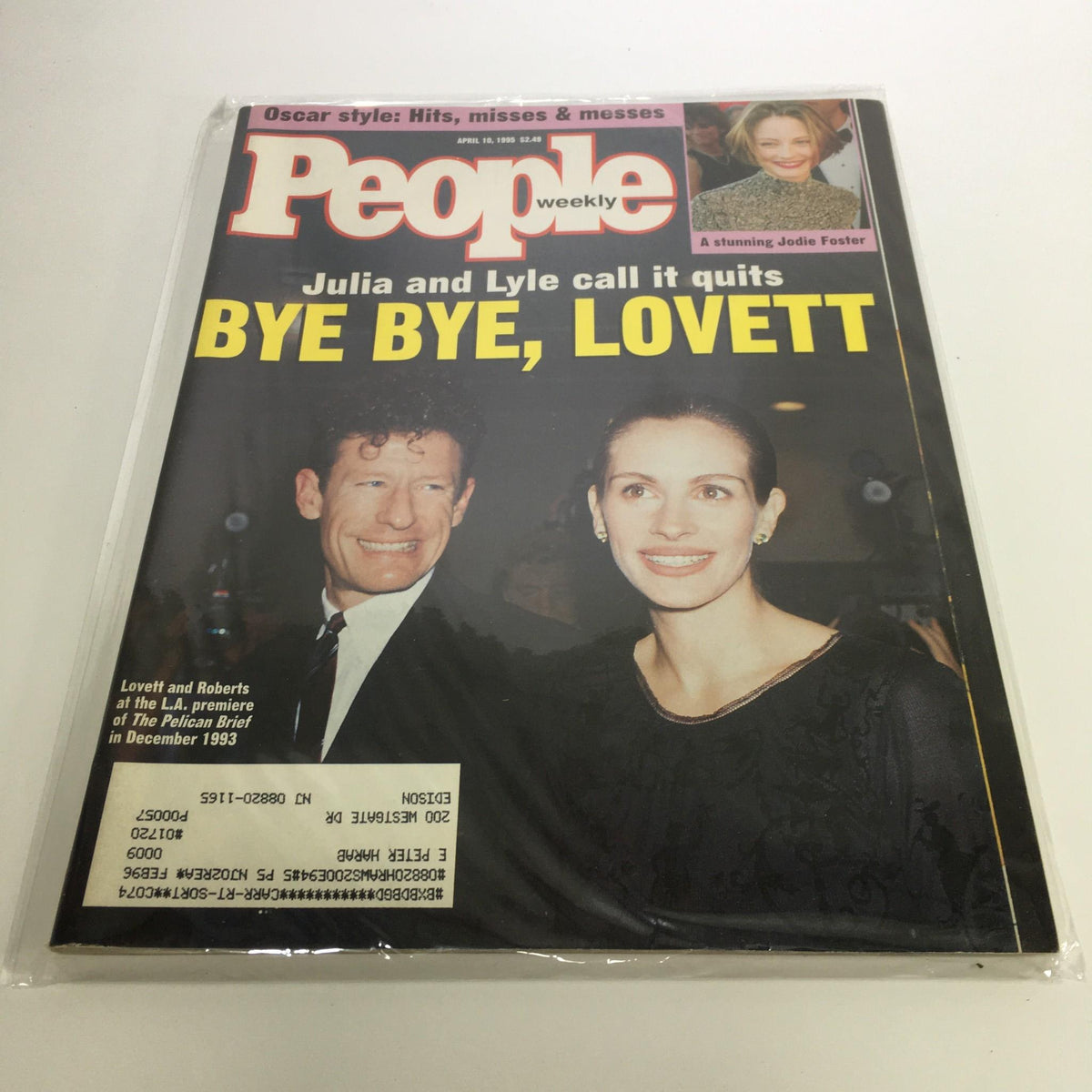 Cover of People Magazine from April 10, 1995 featuring the headline 'Julia and Lyle Call it Quits So Bye Bye Lovett'. The magazine shows a smiling couple with the woman wearing earrings and the man in a suit. Additional feature includes Jodie Foster.