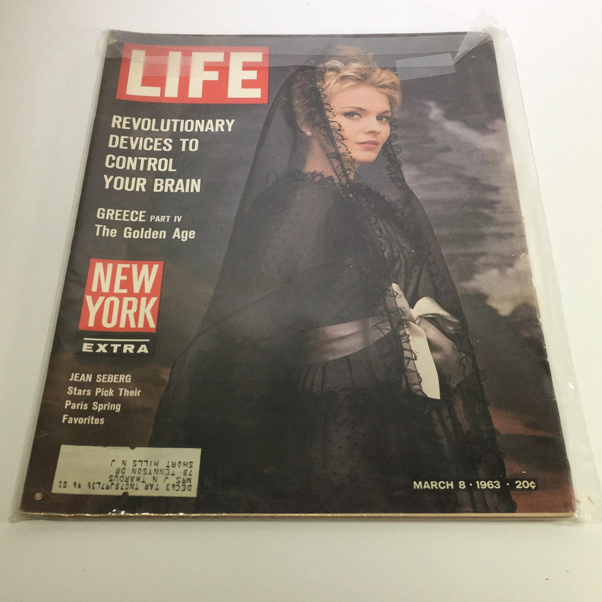 Cover of Life Magazine, March 8, 1963 featuring Jean Seberg showcasing Paris Spring favorites. The cover highlights revolutionary devices and includes an additional section on Greece, with a stunning image of Seberg in a black veil.