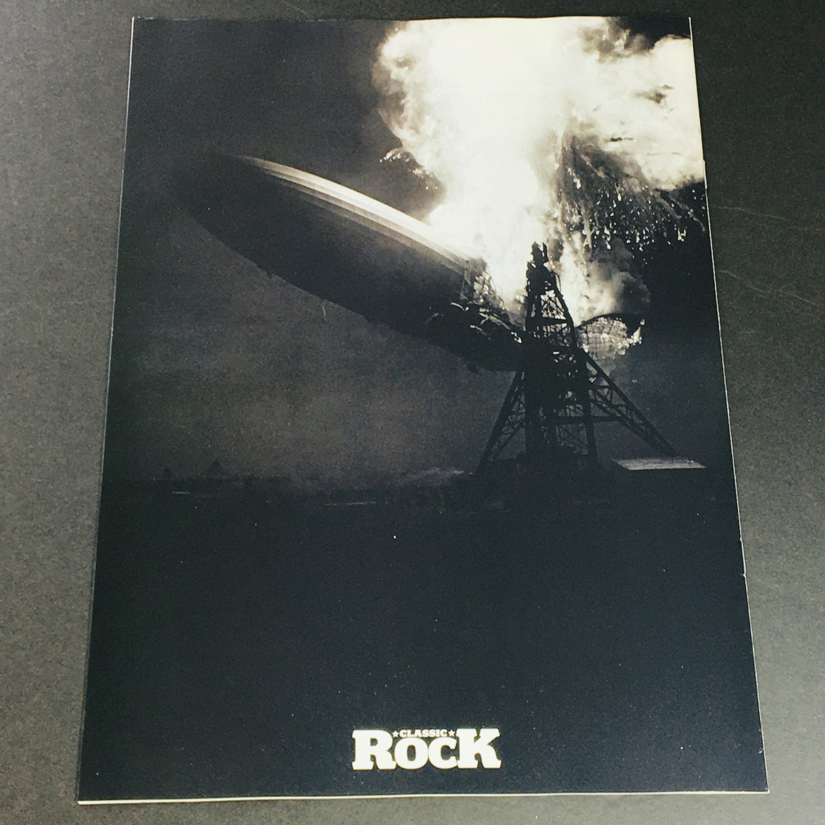 Cover image of Classic Rock Magazine The Story of Led Zeppelin, The Birth of a Legend UK Import featuring a dramatic depiction of the Hindenburg disaster, symbolizing the band's explosive energy and legendary status in rock music.