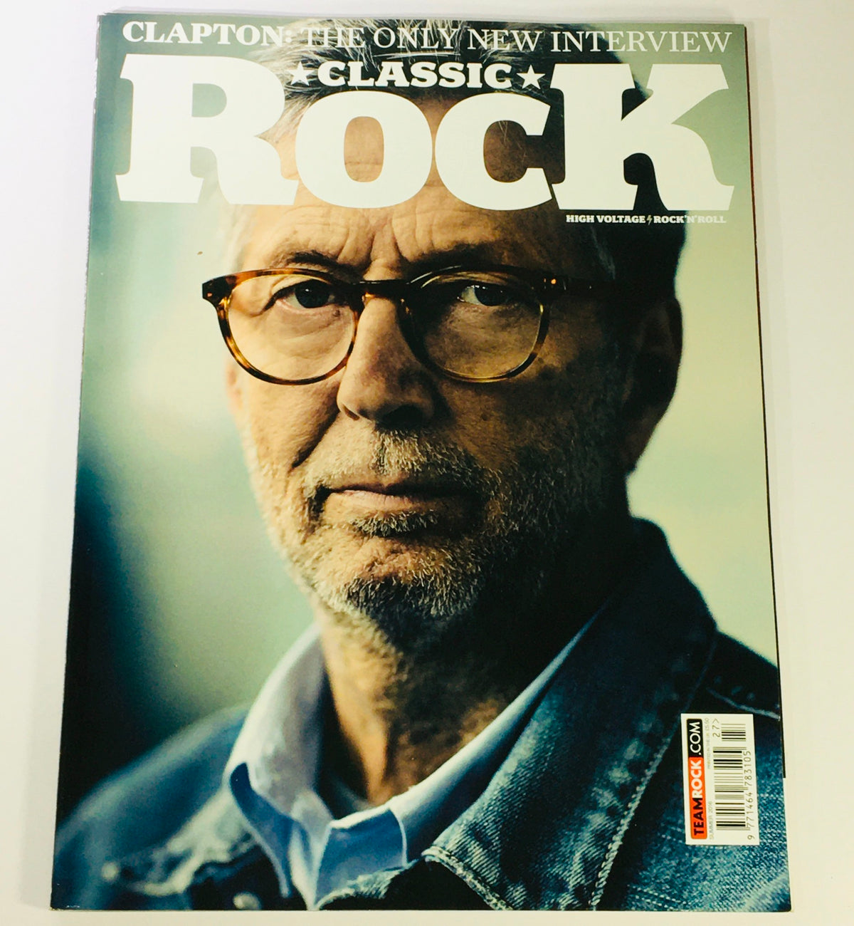 Cover of Classic Rock Magazine Summer 2016 #225 featuring Eric Clapton, showcasing an exclusive interview with the legendary guitarist. The cover highlights his iconic look with glasses and denim jacket, symbolizing the rich culture of rock music.