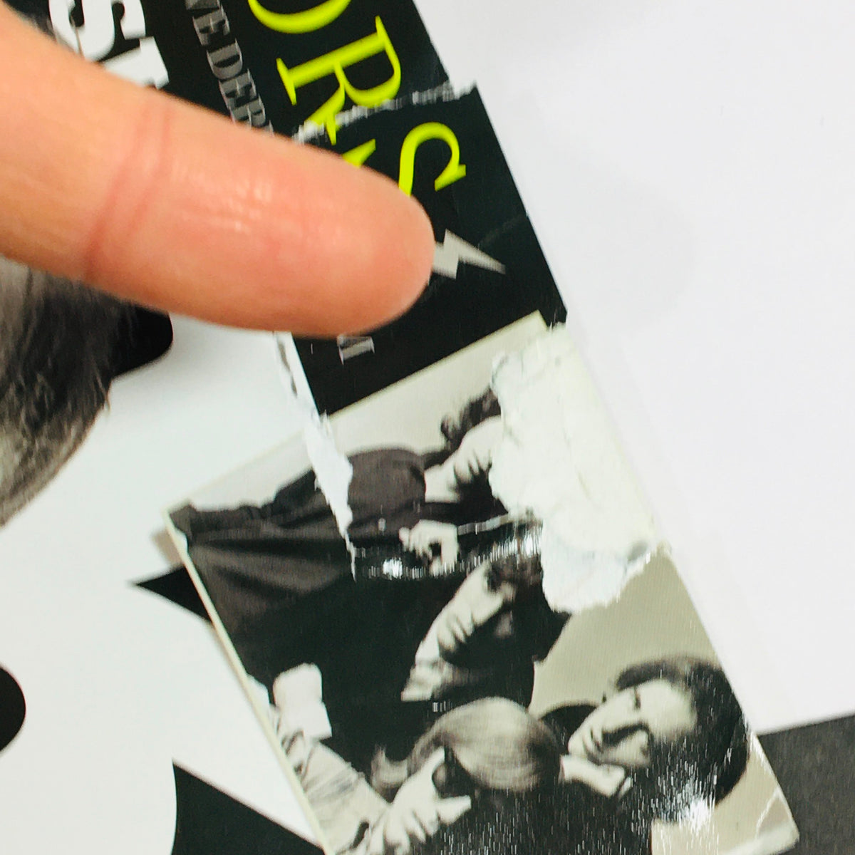 Close-up of Classic Rock Magazine March 2017 #233 showing a damaged corner, emphasizing its vintage condition.