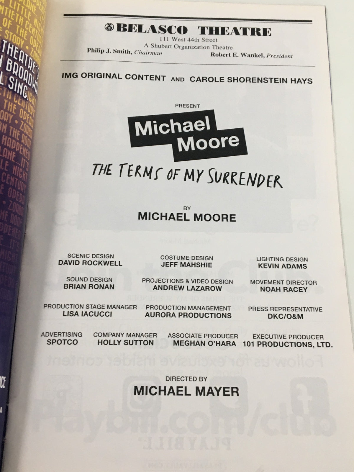 Promotional page for Michael Moore's show 'The Terms of My Surrender' at Belasco Theatre in the 2017 Playbill, highlighting production details and the creative team.