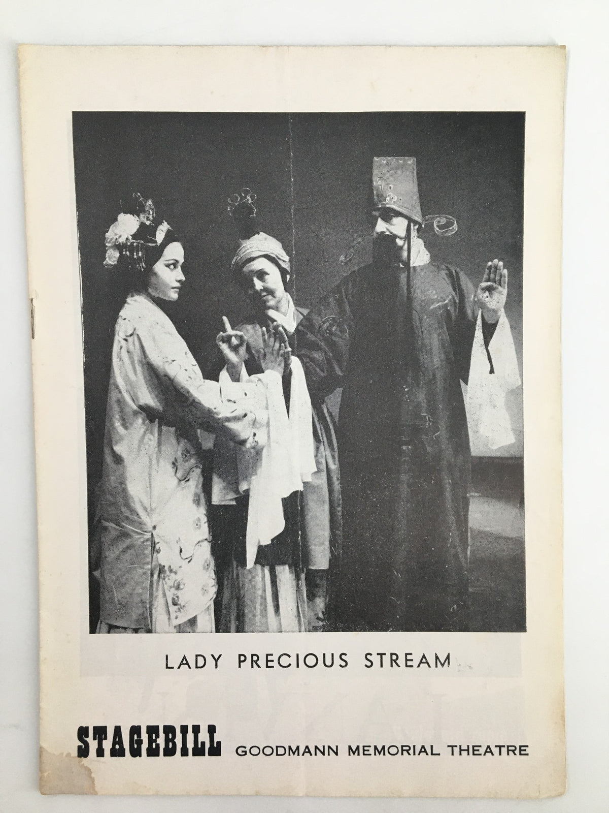 1958 Stagebill for Lady Precious Stream featuring a captivating performance scene featuring actors in traditional costumes at Goodman Memorial Theatre.