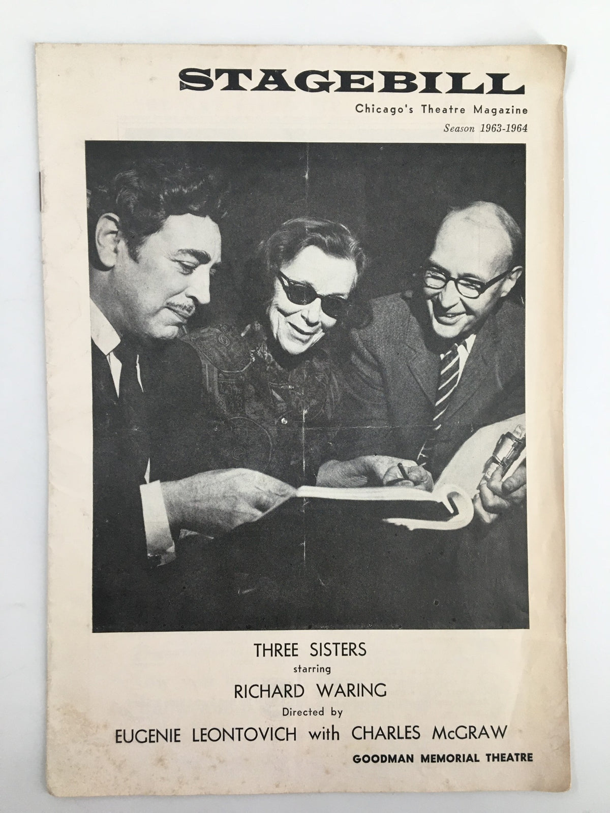 1963 Stagebill The Goodman Theatre featuring Richard Waring in Three Sisters, showcasing a vintage black and white photograph of the cast and production team.