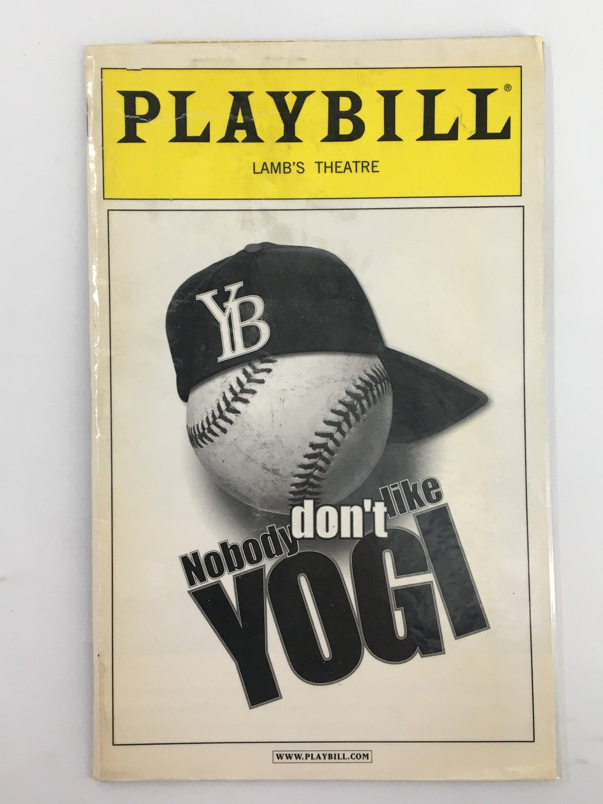 2003 Playbill for Lamb's Theatre production of Nobody Don't Like Yogi featuring a baseball and the title prominently displayed.
