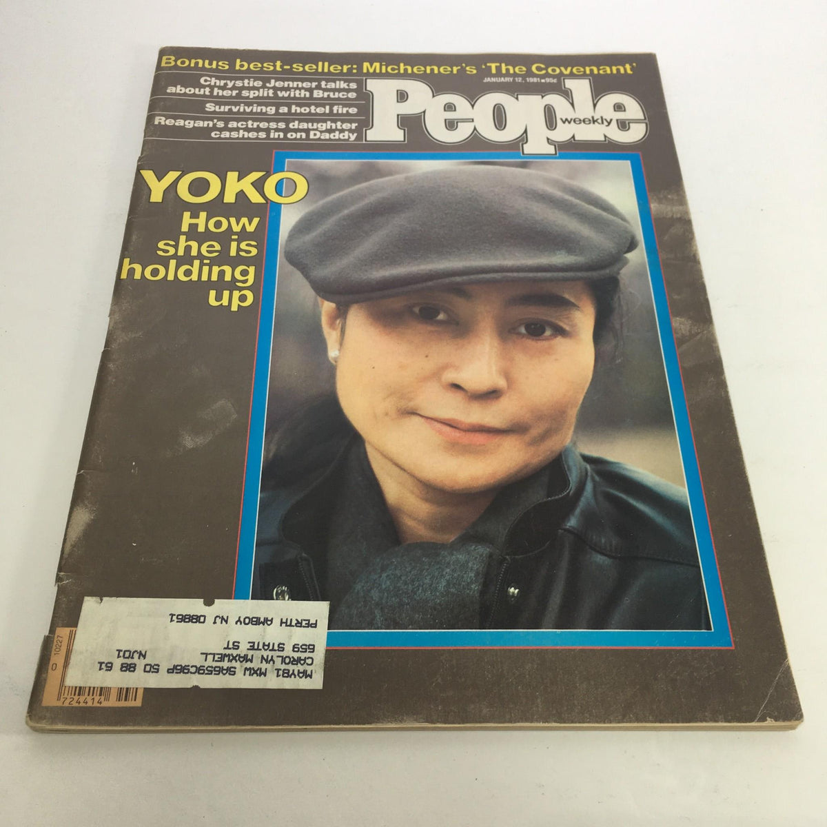 Cover of People Magazine dated January 12, 1981 featuring Yoko Ono with the headline 'How is She Holding Up'. The magazine showcases a photograph of Yoko Ono wearing a cap, highlighting her resilience during a transformative era. Perfect collectible for fans of music history and pop culture.