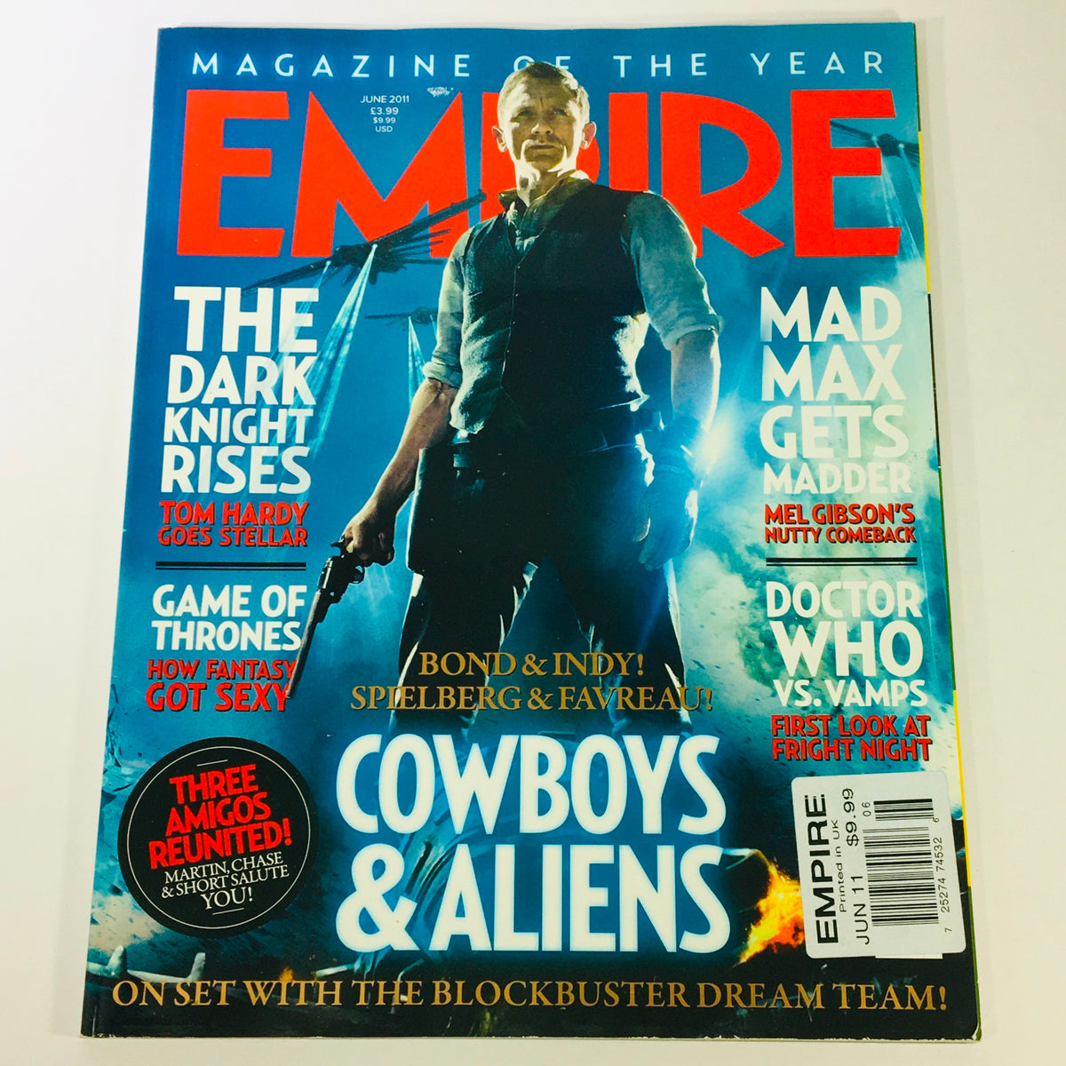 Empire Magazine June 2011 cover featuring Tom Hardy with the headline 'COWBOYS & ALIENS', showcasing iconic movies like 'The Dark Knight Rises' and 'Mad Max'. A UK import edition, perfect for collectors.