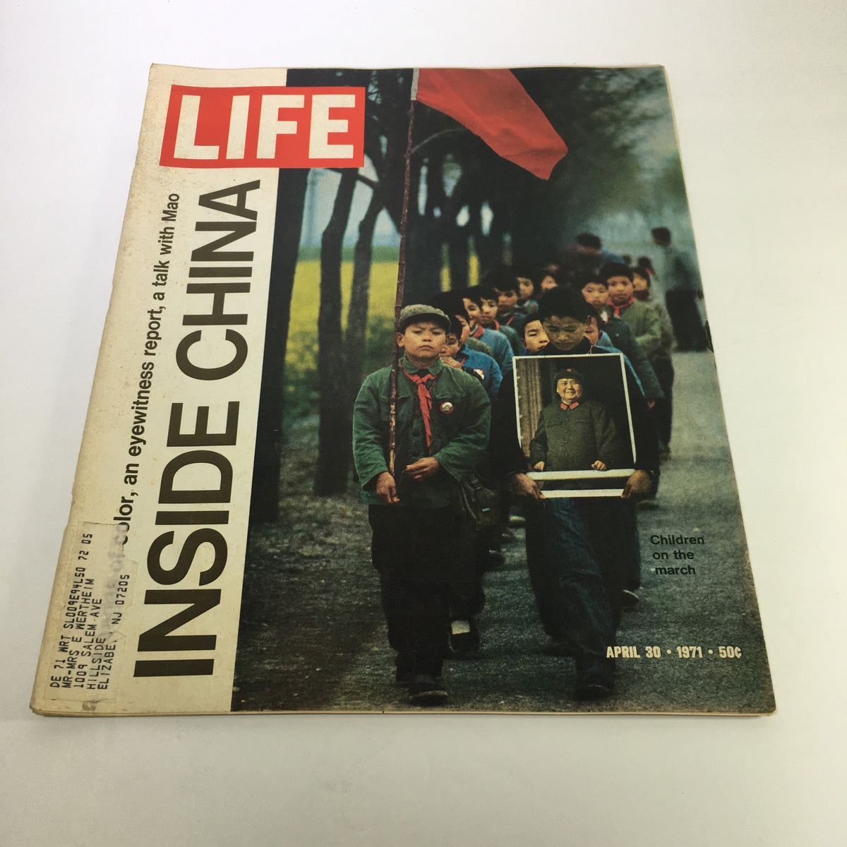 Vintage Life Magazine cover dated April 30, 1971, titled 'Inside China: Children on the march'. The cover features children marching along a path, with one child holding a portrait, showcasing historical moments from China during the early 1970s.