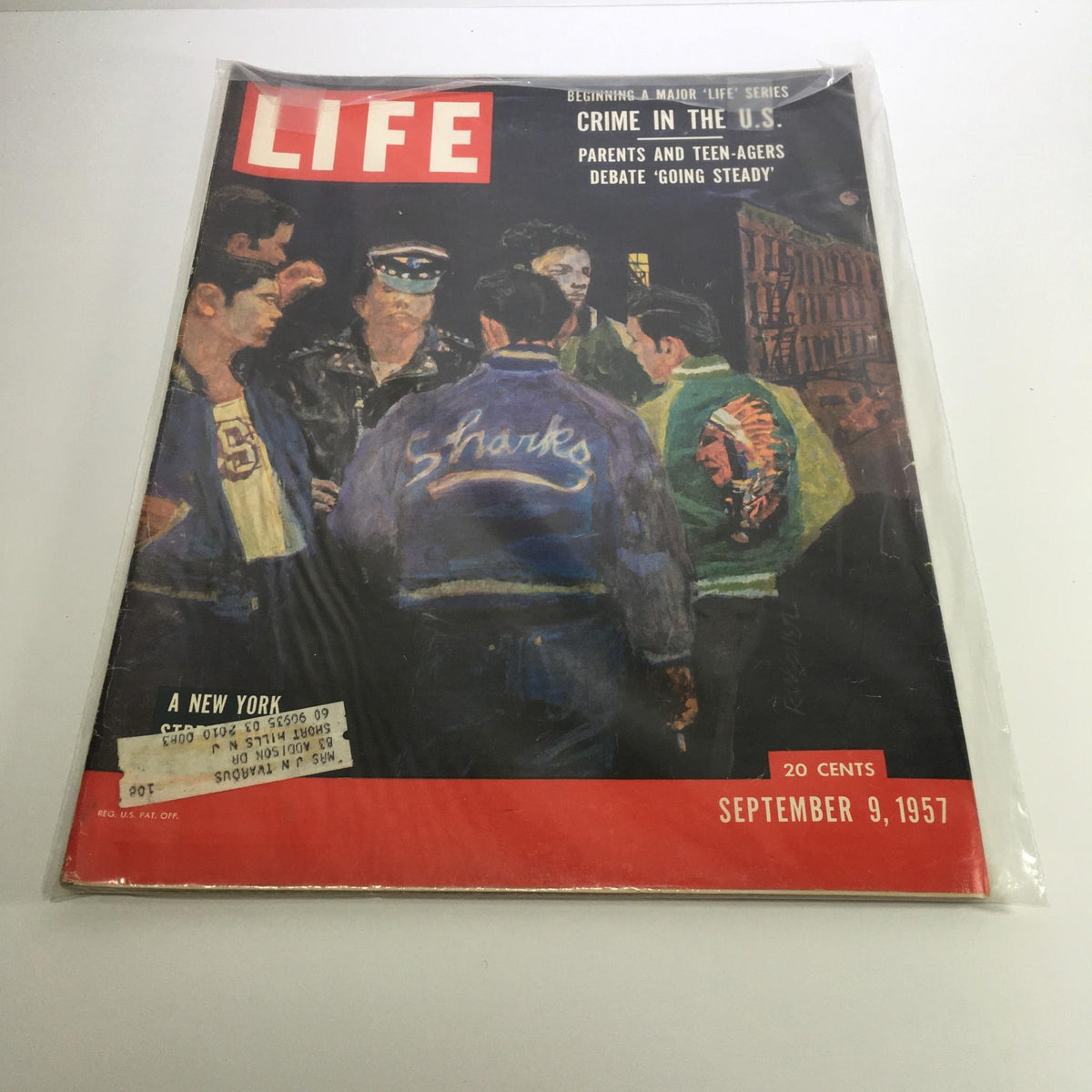 Life Magazine cover from September 9, 1957, featuring a major series on crime in the U.S., depicting a group of young men and a police officer in conversation, capturing the societal concerns of 1950s America.
