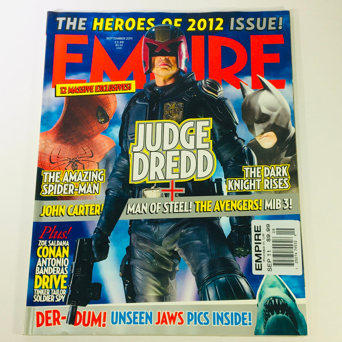 Empire Magazine September 2011 cover featuring Judge Dredd, The Amazing Spider-Man, and Batman. Celebrating the heroes of 2012, this issue includes exclusive content on major film releases. A collectible for movie enthusiasts.