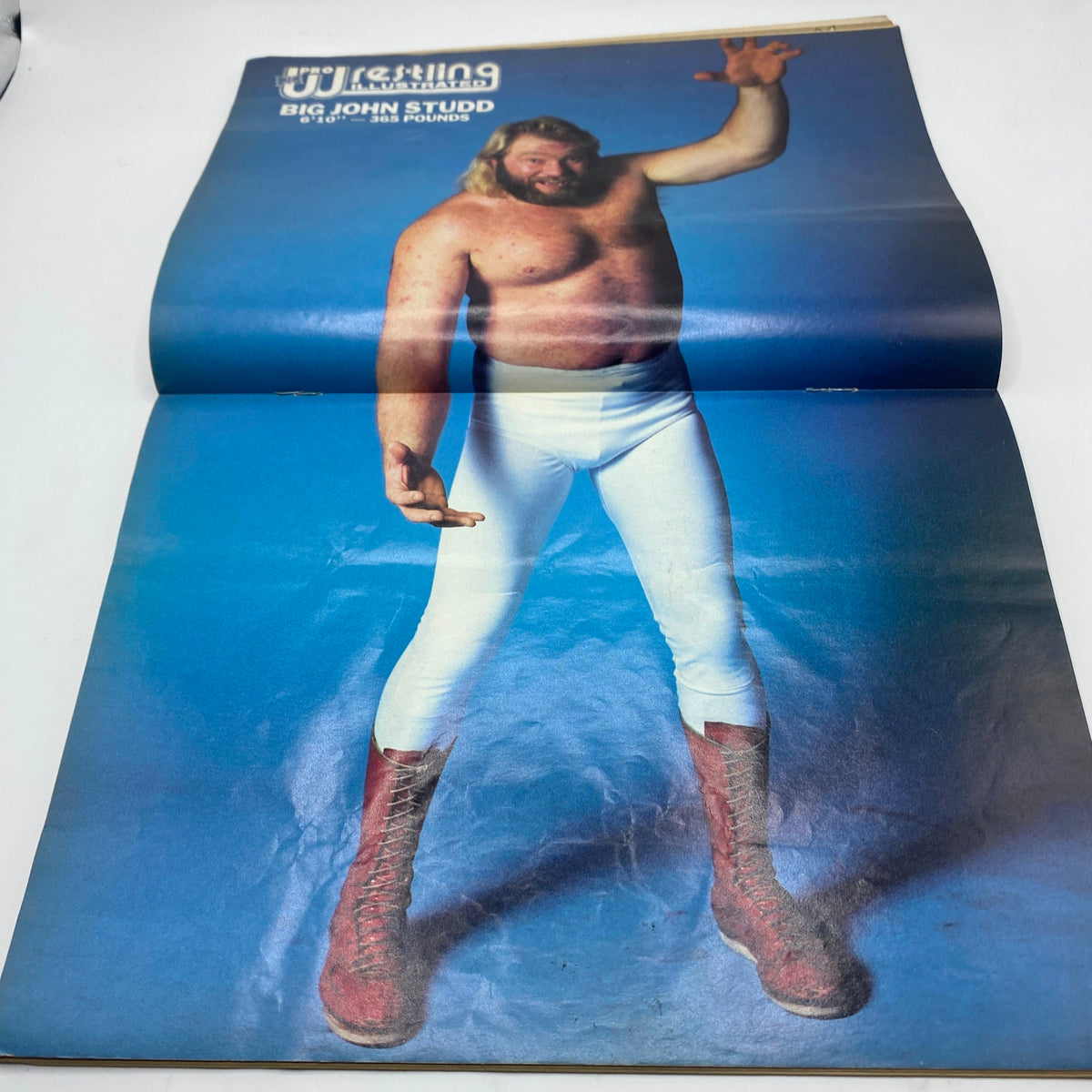 Centerfold poster from Pro Wrestling Illustrated Magazine October 1986 showcasing Big John Studd in wrestling attire.