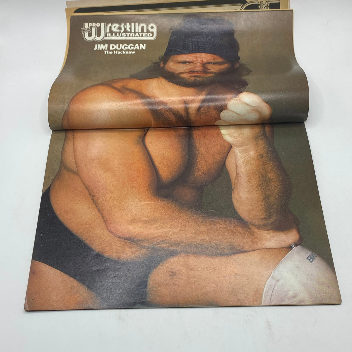 Centerfold of Pro Wrestling Illustrated Magazine January 1986 featuring Jim Duggan, highlighting a prominent wrestling personality.
