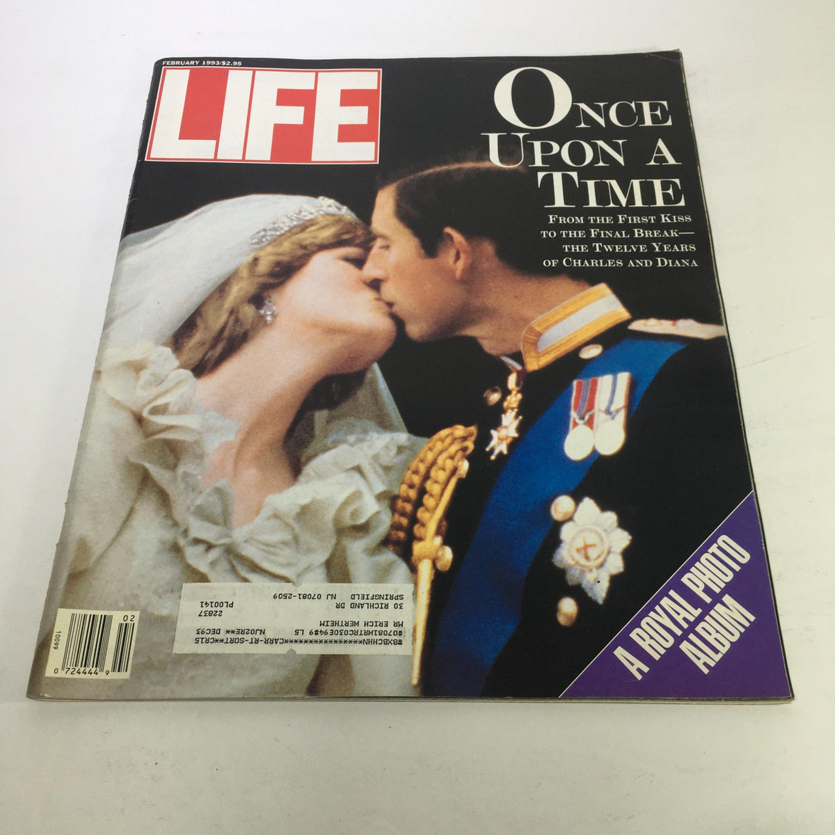 Cover of Life Magazine from February 1993 featuring the article 'Once Upon A Time - The 12 Years of Charles & Diana'. The image showcases a close-up of Prince Charles kissing Princess Diana, encapsulating their royal romance.