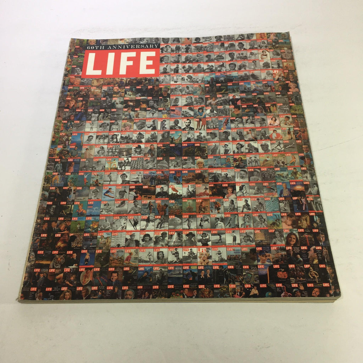Cover of Life Magazine: October 1996 - 60th Anniversary Collector's Edition featuring a collage of iconic photographs and the bold 'LIFE' title, commemorating the magazine's rich history and memorable moments.