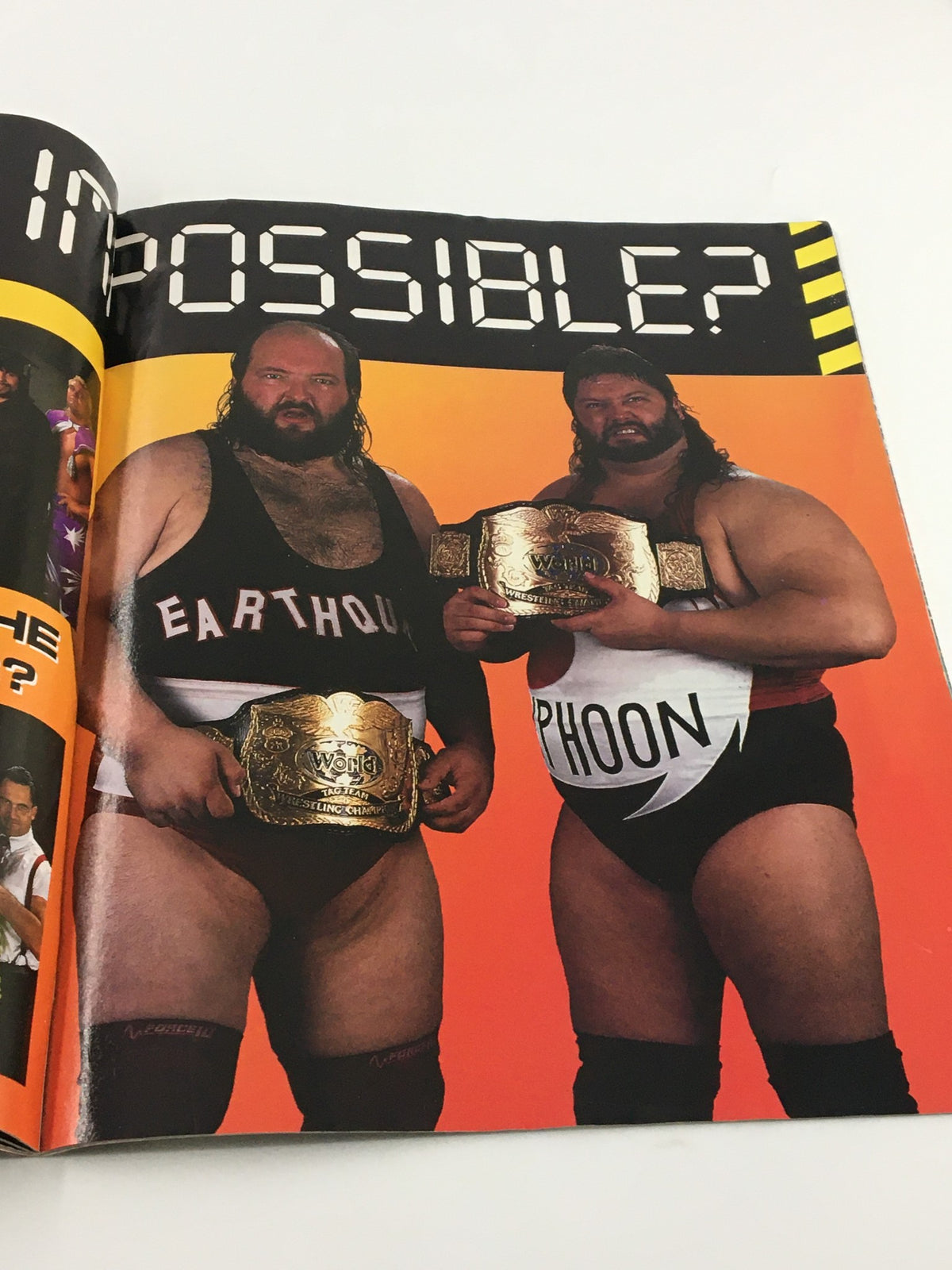 VTG WWF Magazine October 1992 featuring wrestlers Earthquake and Typhoon holding championship belts, showcasing a vibrant wrestling era.
