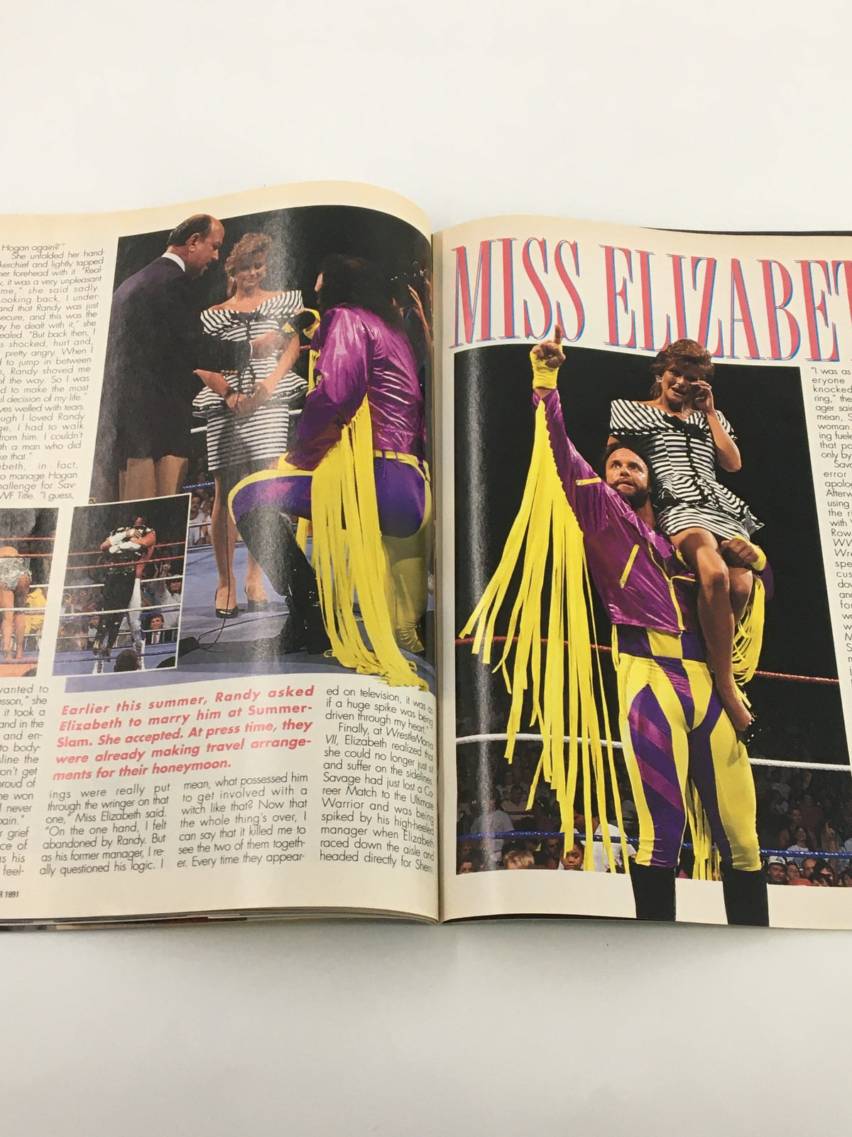 VTG WWF Magazine October 1991 showing Miss Elizabeth on stage with Randy Savage and a colorful wrestling match background.