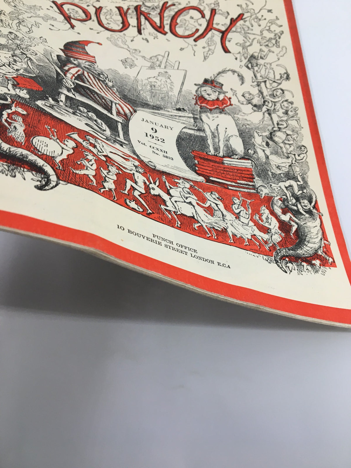 Close-up view of the cover of VTG Punch January 9 1952 magazine, highlighting colorful artwork and vintage design elements, representing humor from the past.