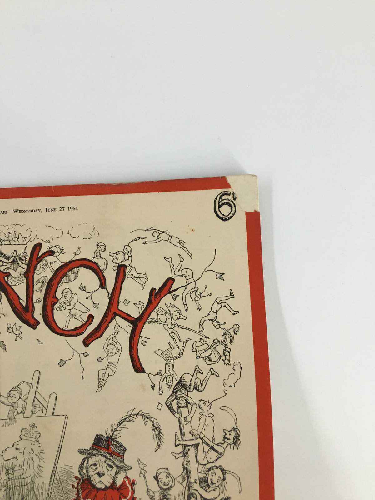 Top view of the cover of VTG Punch Magazine June 27 1951 showcasing details of the title and whimsical artwork, reflecting the humor of the time.