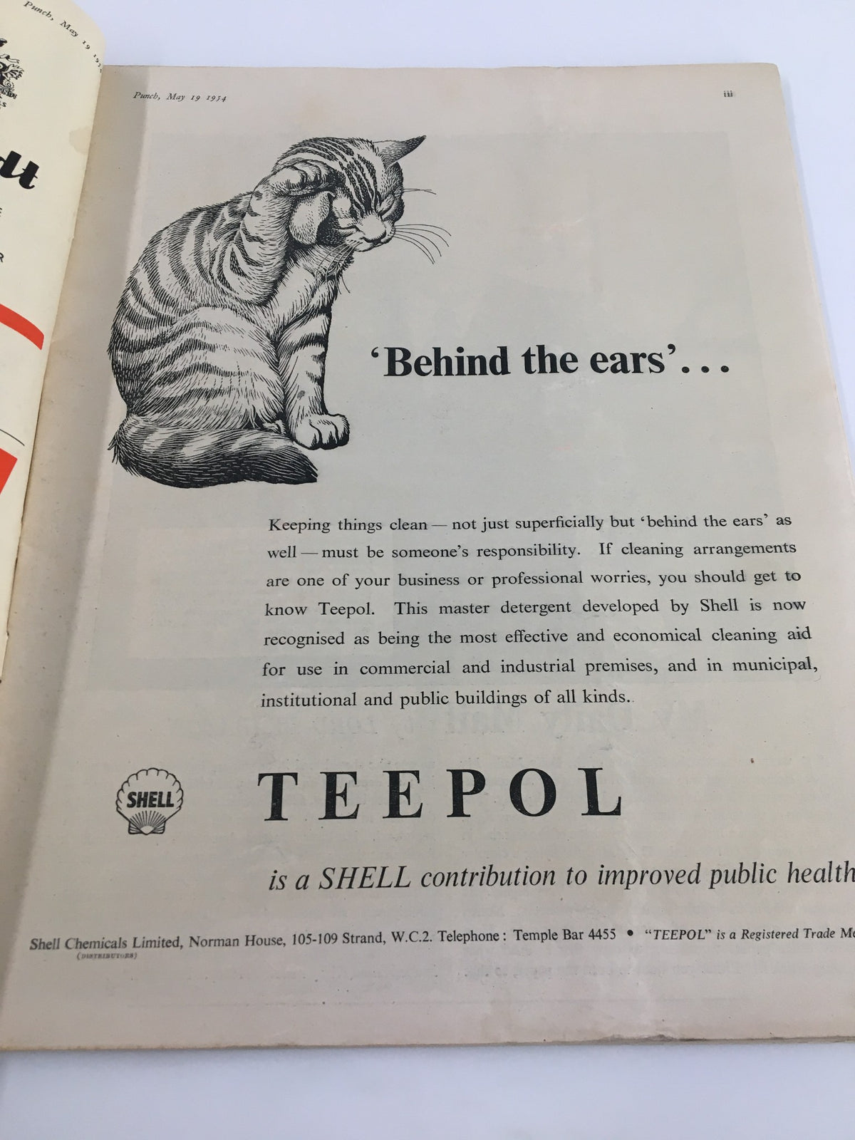 Inside page of the VTG Punch Magazine from May 19, 1954, featuring a humorous advertisement with a cat illustration, emphasizing vintage advertisements from the era.