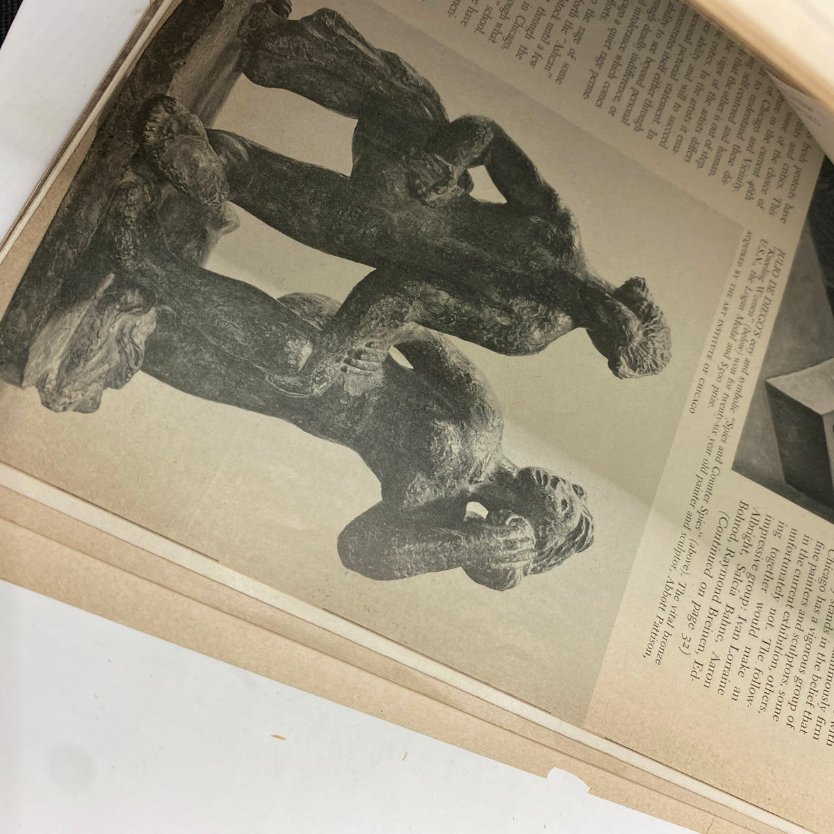 Inside page of the Art News Magazine from April 1, 1942, displaying a black and white image of sculptures with accompanying text.