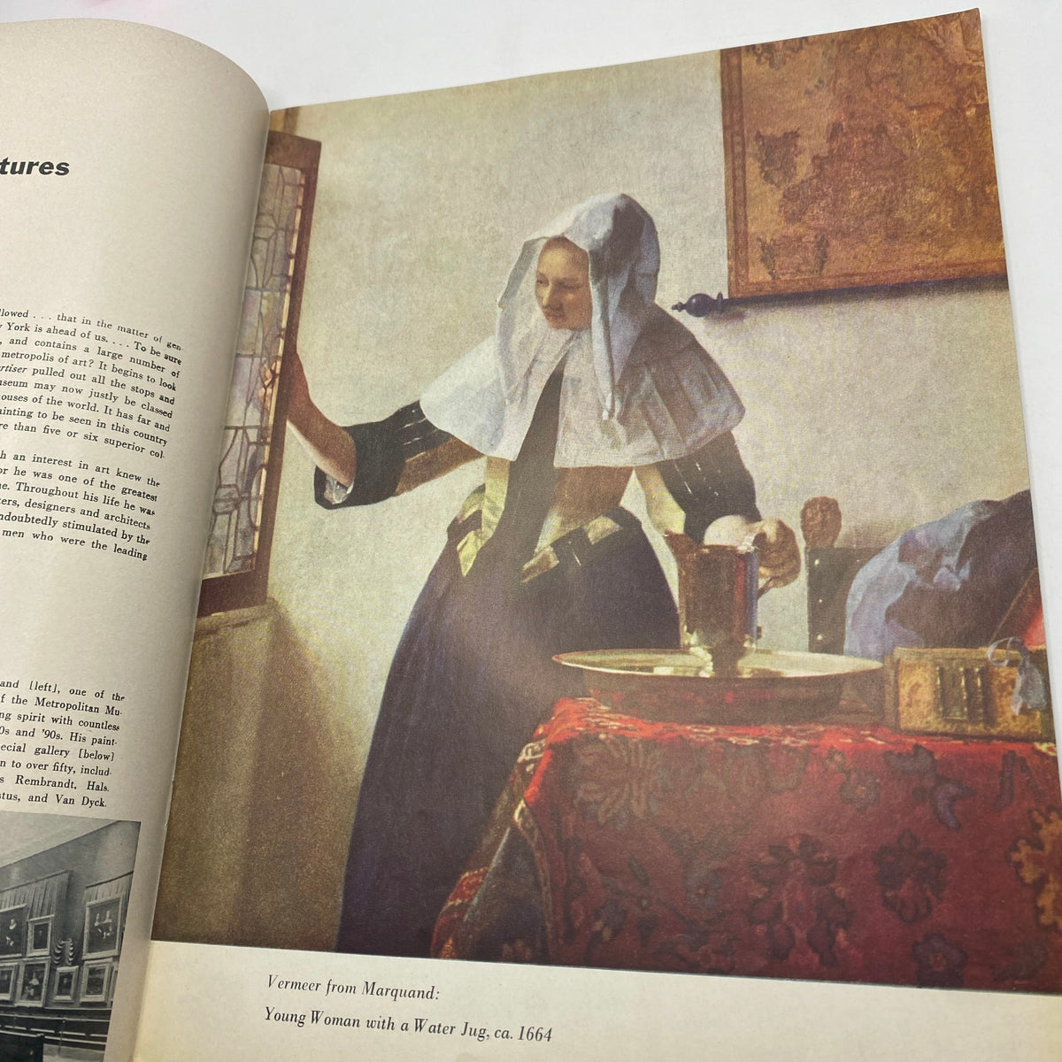 Interior page of VTG Art News Magazine January 1954 showcasing the painting 'Young Woman with a Water Jug' by Vermeer, highlighting the artistic features and historical context.