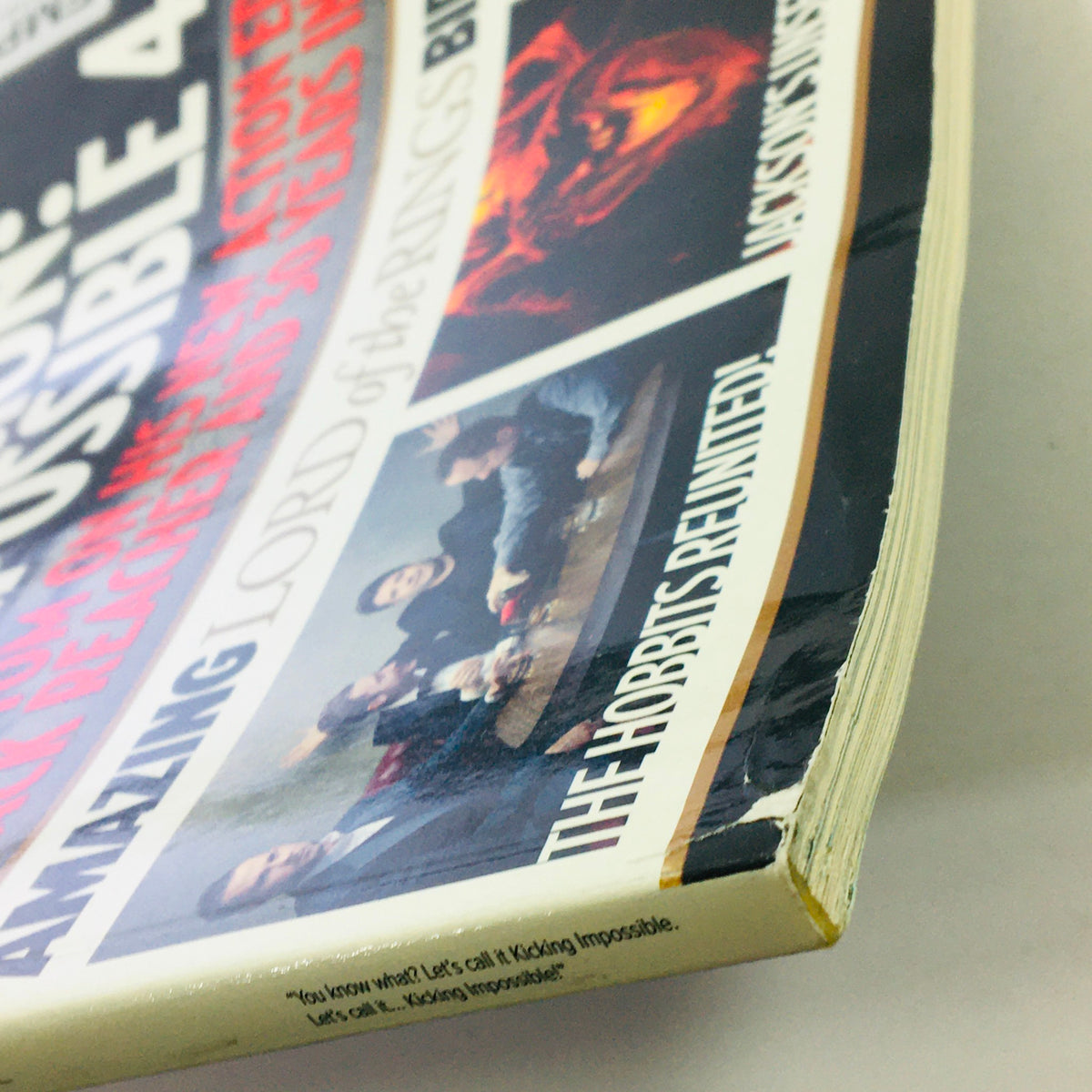 Close-up view of Empire Magazine December 2011, highlighting the magazine's spine with promotional elements and anniversary features related to the film industry.