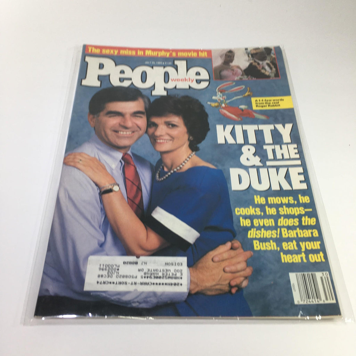Vintage People Magazine cover from July 25, 1988, featuring 'Kitty & The Duke'. The cover displays a smiling couple, with the headline 'He mows, he cooks, he shops - he even does the dishes!' highlighting the engaging content of the magazine.
