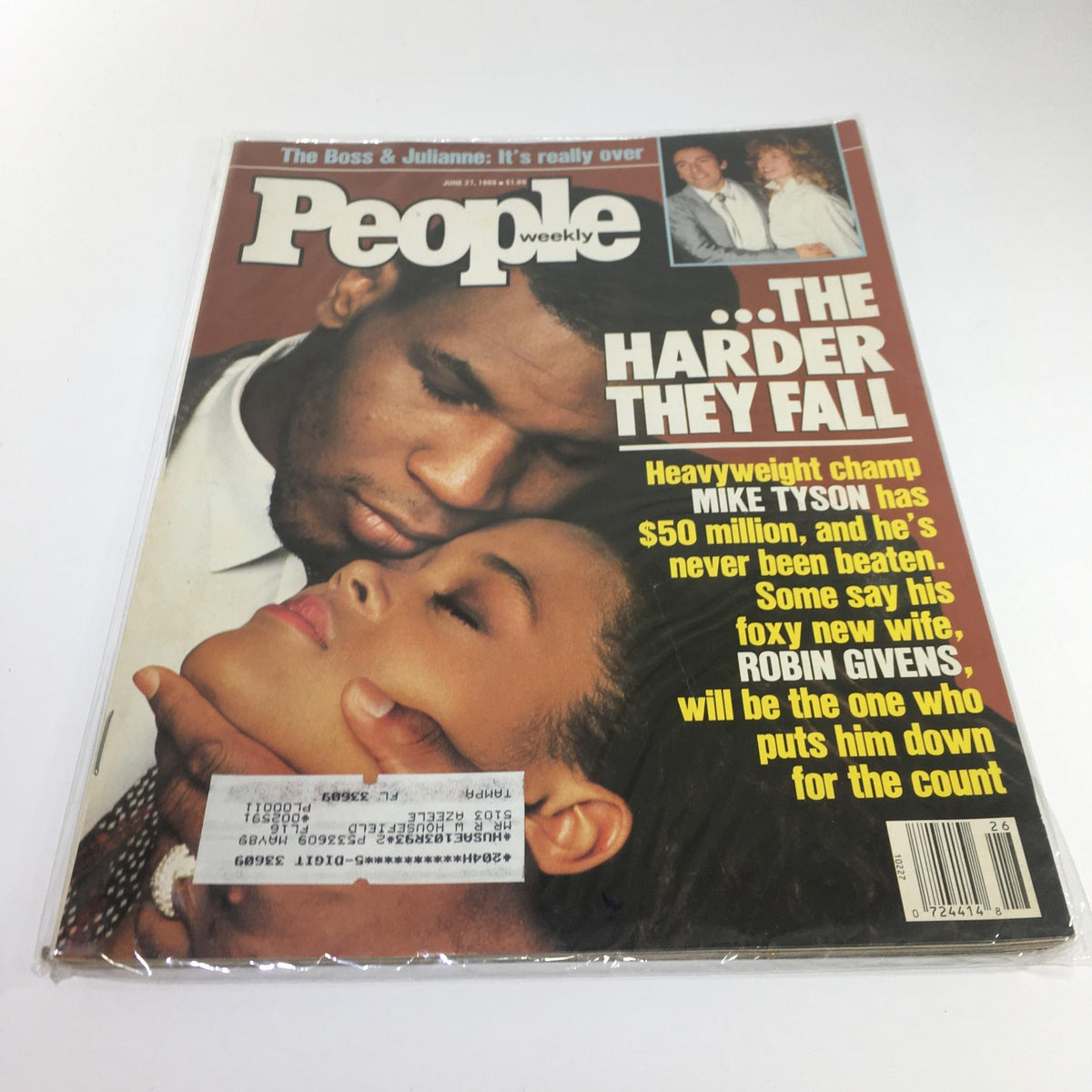 Vintage People Magazine cover from June 27, 1988 featuring Mike Tyson and Robin Givens with the headline 'The Harder They Fall'. Celebrate the iconic couple as heavyweight champion Mike Tyson's life and marriage to Robin Givens is highlighted. Great condition with protective wrap.