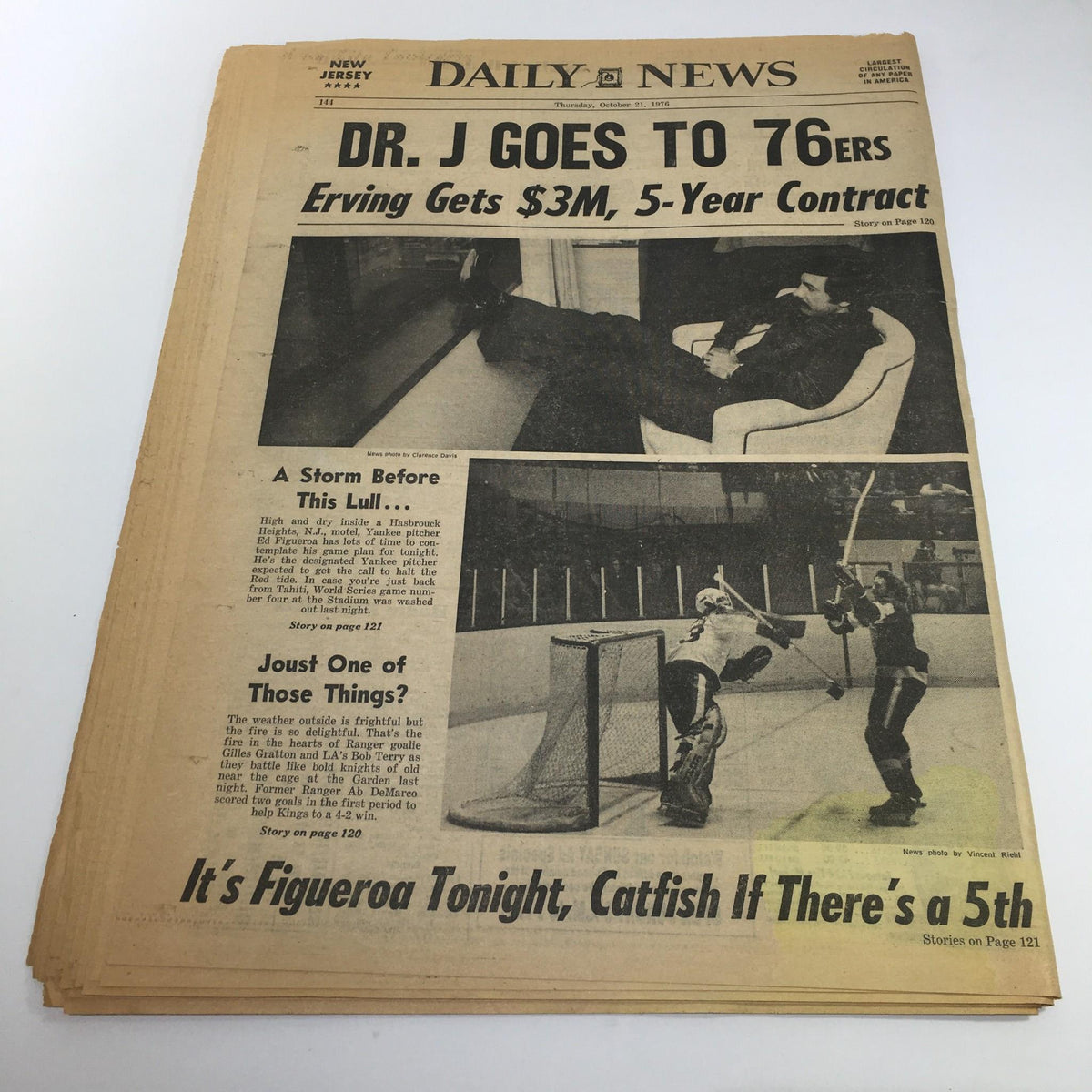 Front page of NY Daily News from October 21, 1976, featuring the headline 'Dr. J Goes To 76ers' detailing Erving's $3 million, 5-year contract, with accompanying images related to sports.