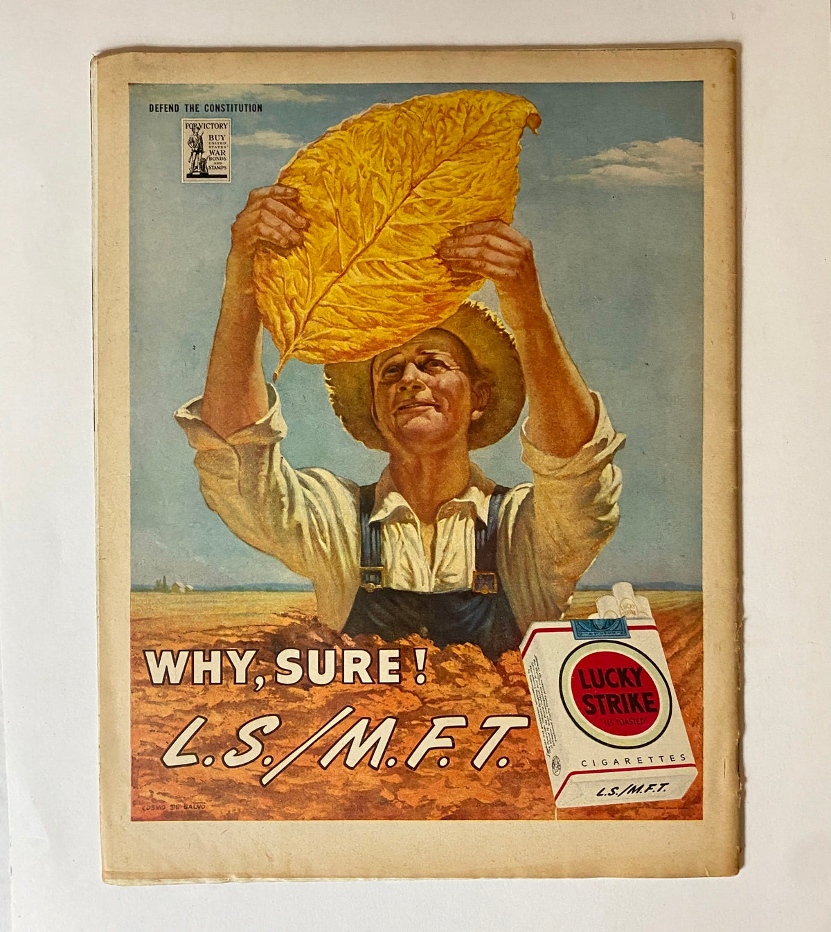 Back cover of the vintage Collier's Magazine January 27, 1945, showcasing an advertisement for Lucky Strike Cigarettes, featuring a farmer holding large tobacco leaves.