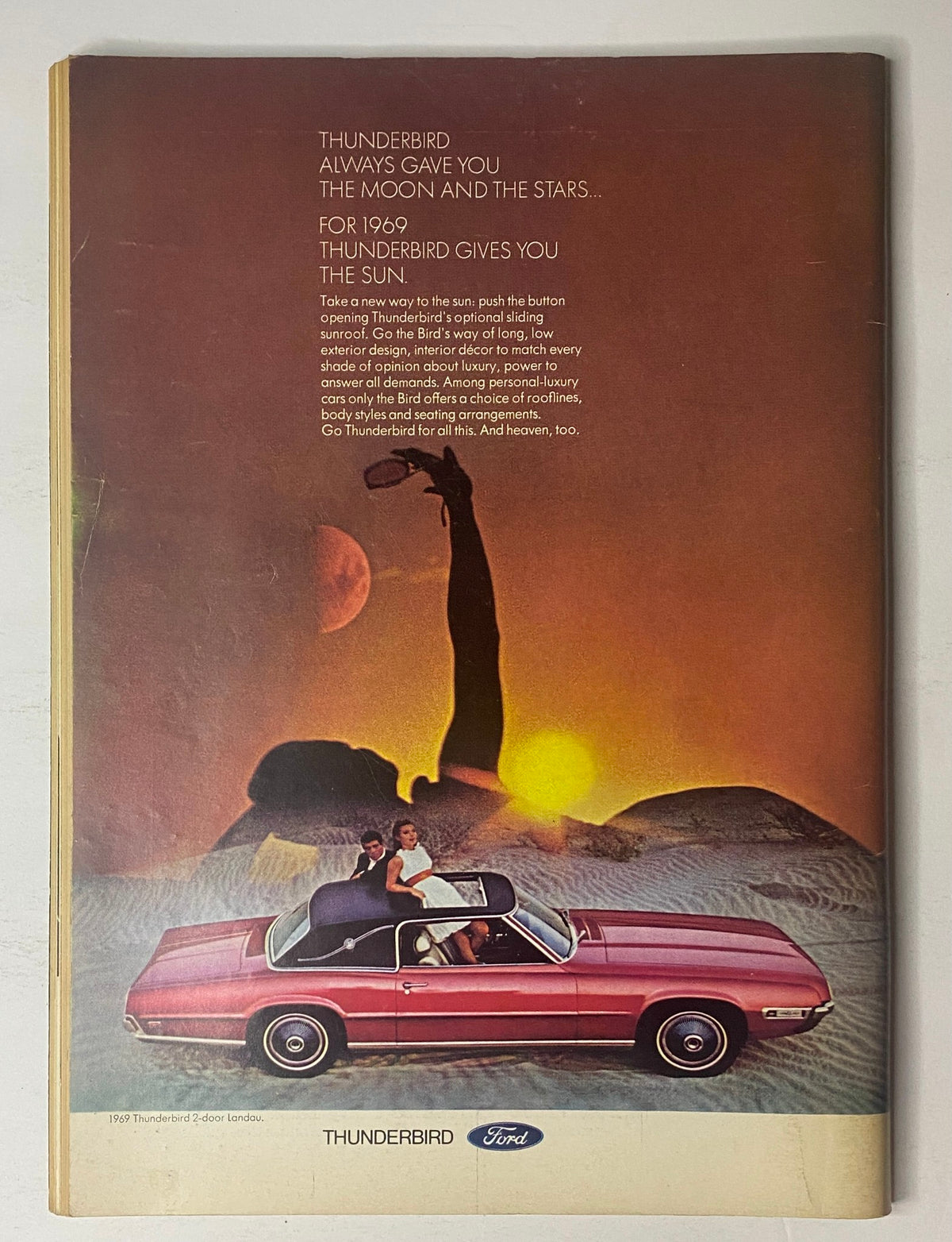 Advertisment from The New Yorker Full Magazine March 8, 1969 showcasing the Ford Thunderbird with a couple, highlighting the luxury features of the car.