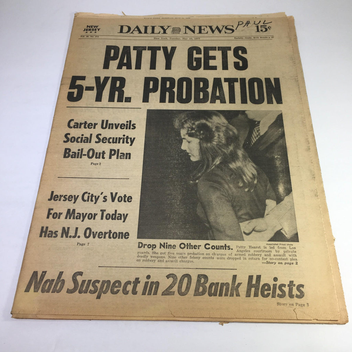 NY Daily News from May 10, 1977, featuring the headline 'Patty Gets 5-Yr. Probation; Drop Nine Other Counts' alongside an image relating to Patty Hearst's legal case.