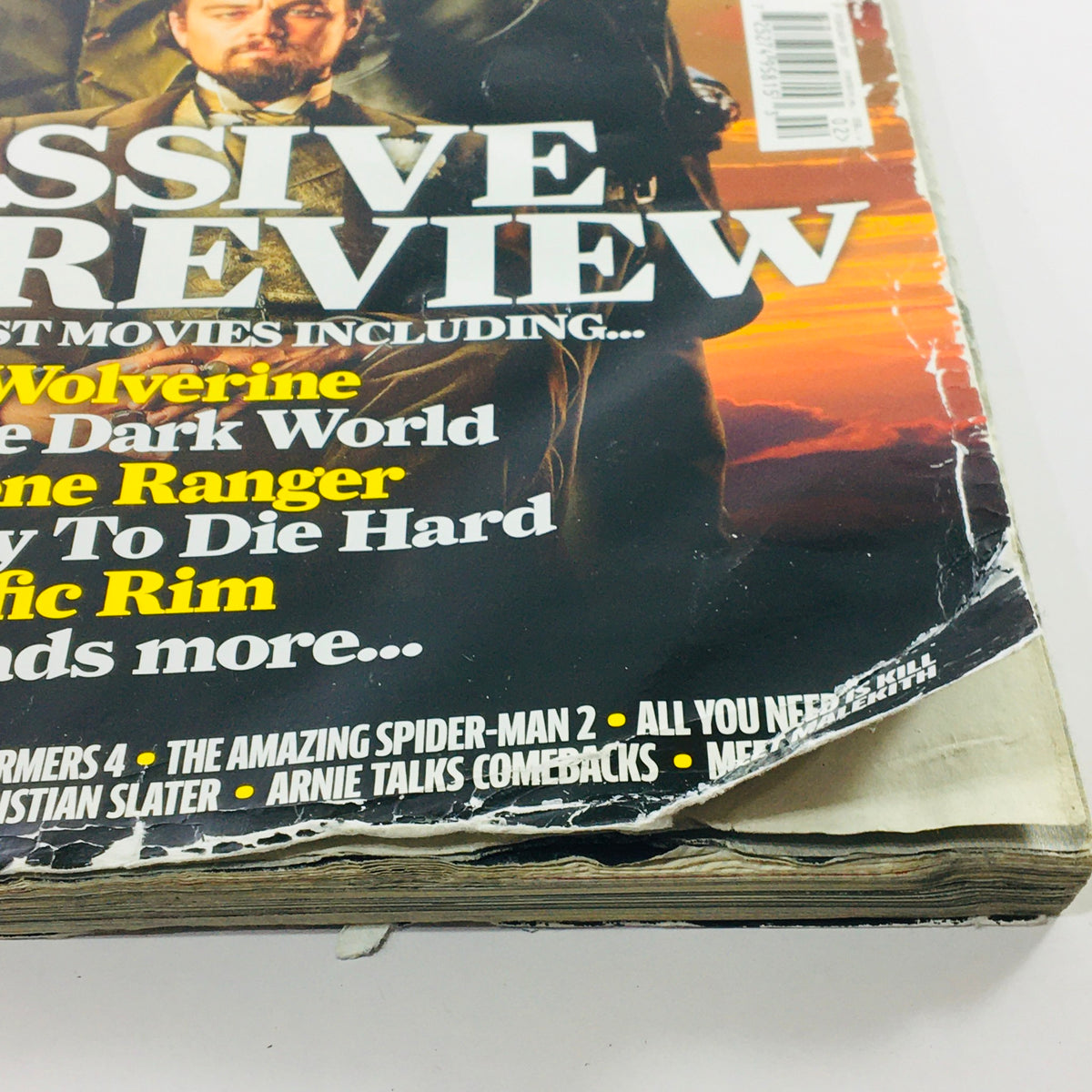 Close-up of the edge of Total Film Magazine February 2013 #202, featuring visible wear and tear, indicating its vintage nature and collectible appeal.