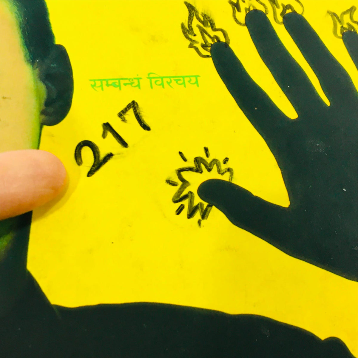 Cover detail of Wired Magazine May 1995 Vol 3 #5 featuring a hand with flames and the number 217, showcasing creative artwork associated with the issue.