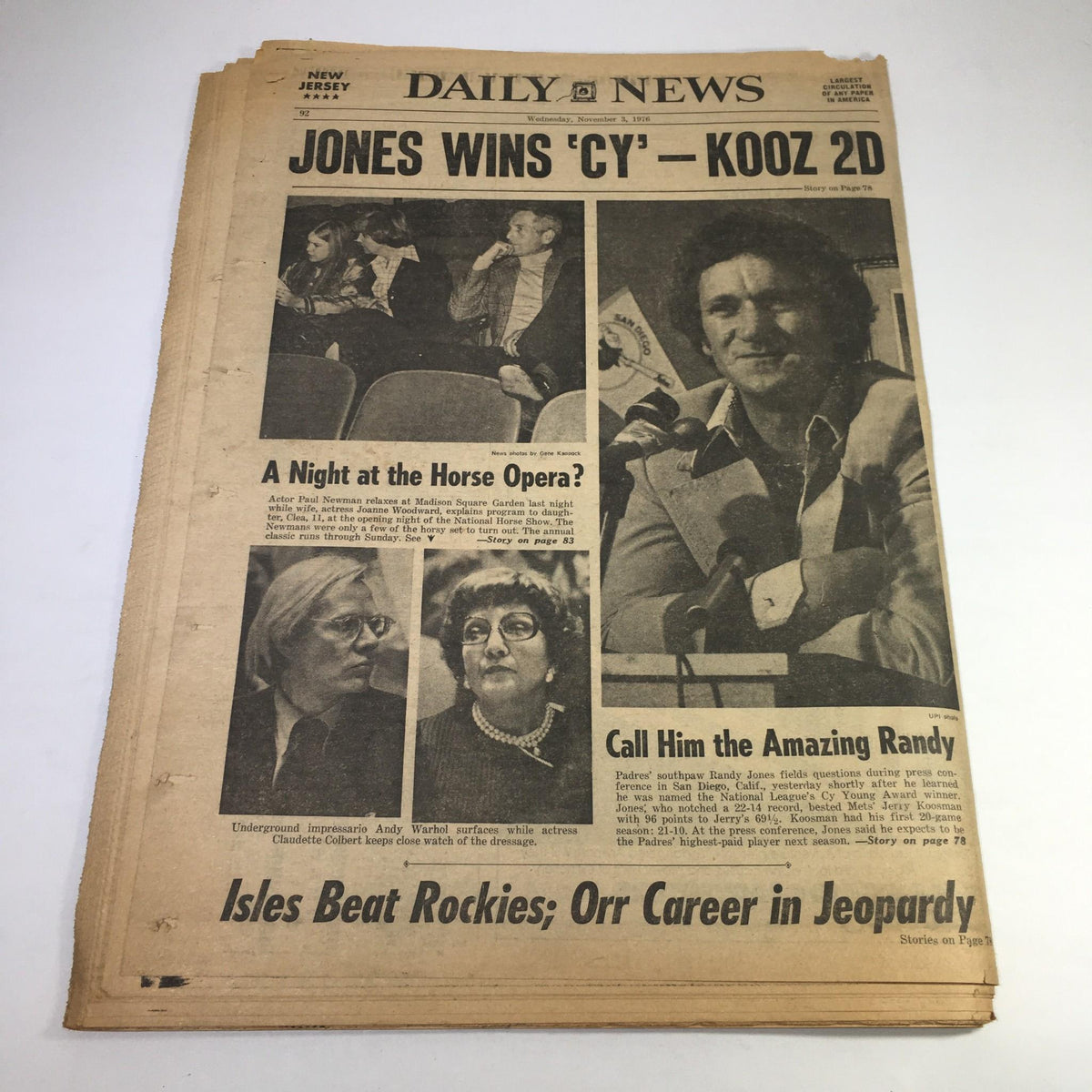 NY Daily News from November 3, 1976, including the headline 'JONES WINS ‘CY’ – KOOTZ 2D'. This image presents the newspaper's coverage of notable events and figures during the 1976 election era.