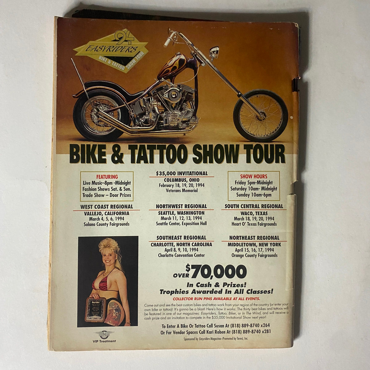 Back cover of Easyriders Magazine April 1994 advertising the Bike & Tattoo Show Tour with event details, a striking motorcycle image, and a model holding a trophy.