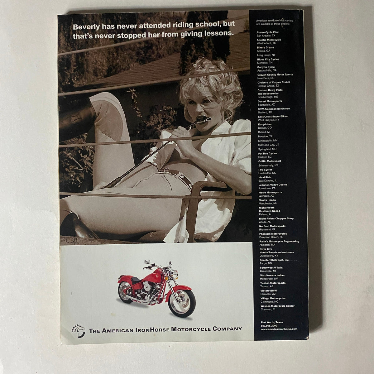 Back cover of Easyriders Magazine July 2000, featuring a model holding a motorcycle, advertising American IronHorse Motorcycle Company.