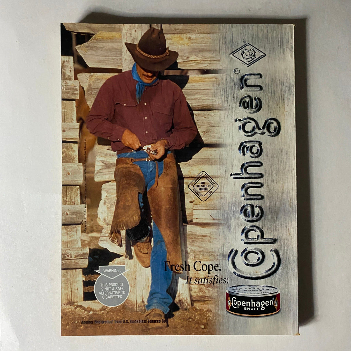 Cover of Easyriders Magazine April 2001 #334 featuring a cowboy-themed illustration with the tagline 'Copenhagen - Fresh Cope. It satisfies.' Perfect for vintage magazine collectors and motorcycle enthusiasts.
